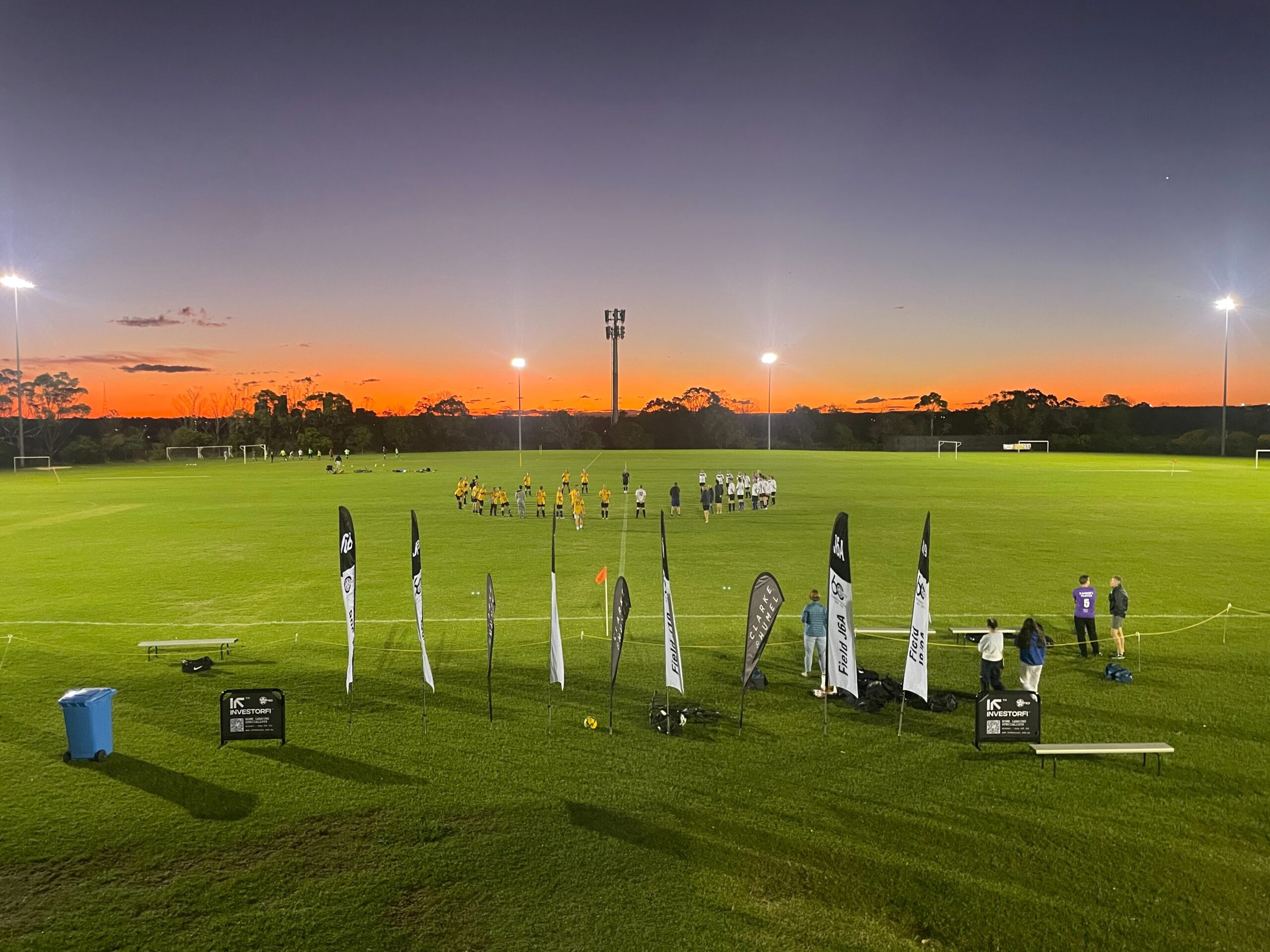 Seaforth and Manly Allambie hold a minute's silence before the Tim Bannigan Memorial Game. Photo credit: Sarah Sauer