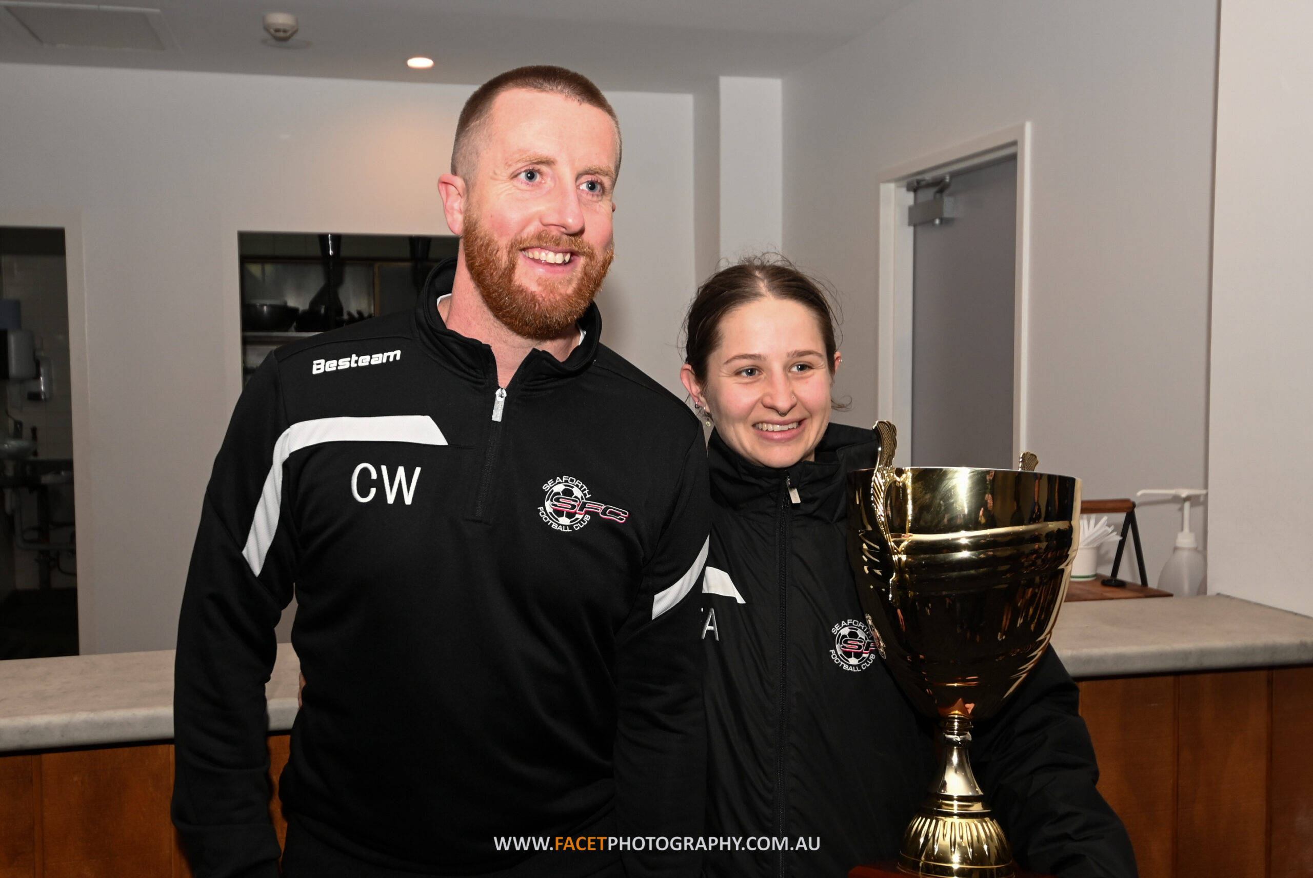 Seaforth Women's Premier League head coach Chris Wood is pictured with the MWFA Challenge Cup trophy after winning the 2022 Final. Photo credit: Jeremy Denham
