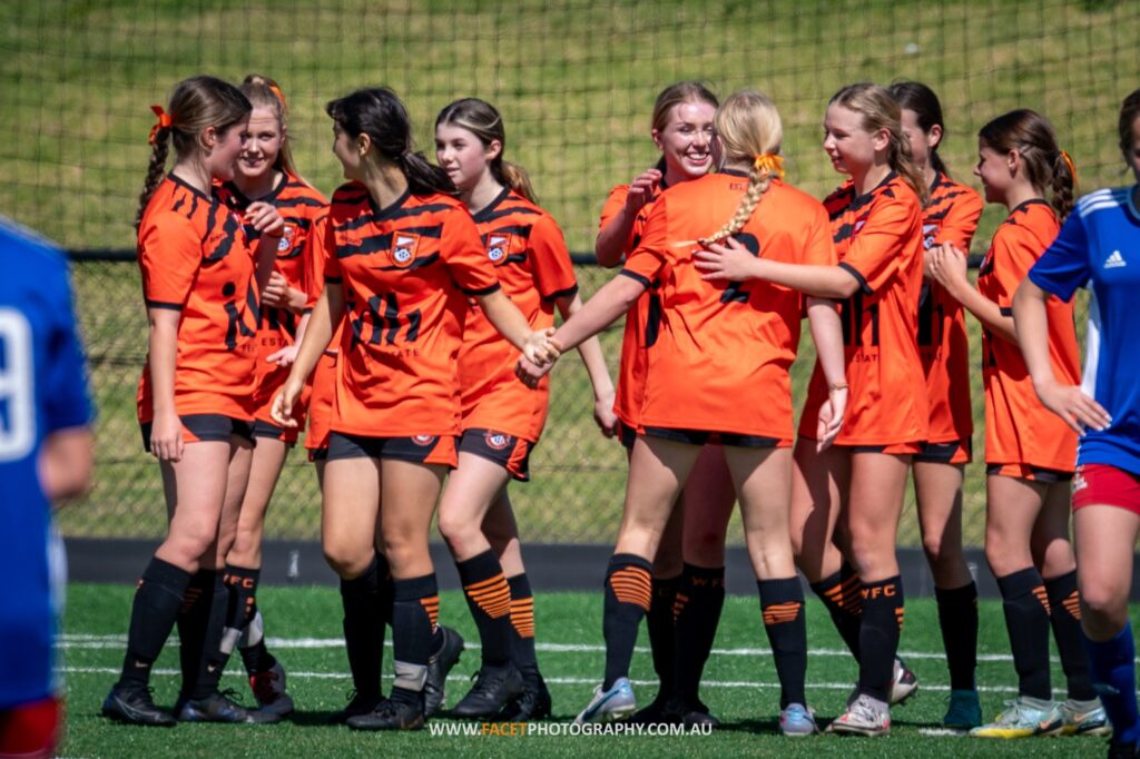 Wakehurst's W15 team celebrates a goal during their 2023 Champion of Champions Round 2 game against Easts FC. Photo credit: Jeremy Denham